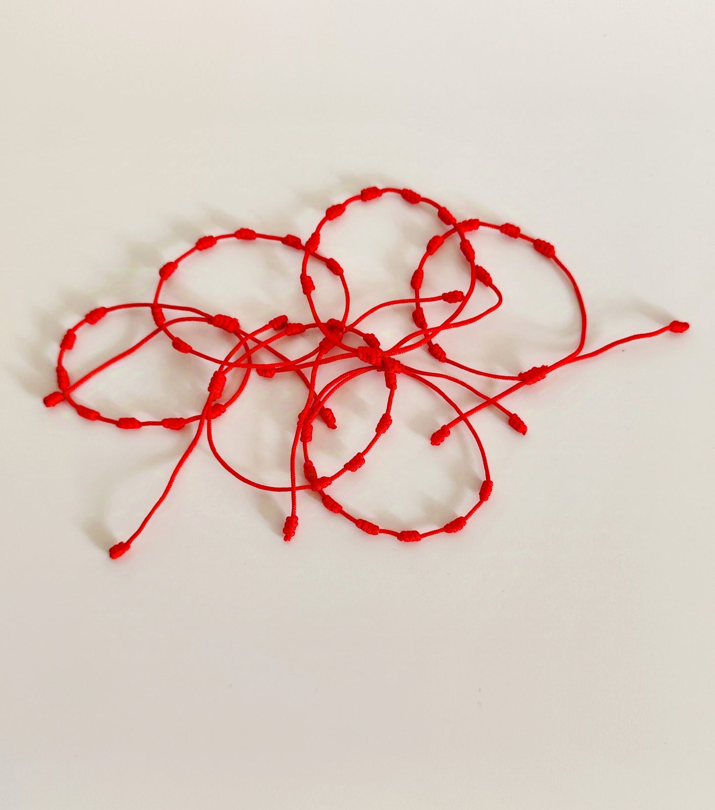 Pulsera Roja de 7 Nudos